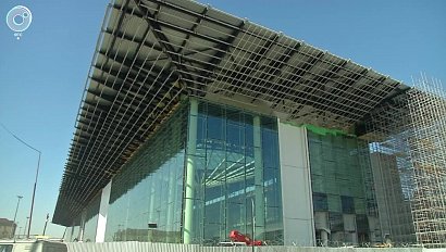 Стеклянный фасад и новейшая багажная система. Когда новый терминал в "Толмачёво" примет пассажиров?